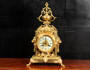 Antique French Gilt Bronze Clock With Lions Masks by Mougin